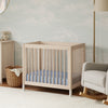 Gelato 4-in-1 Convertible Mini Crib and Twin bed in Natural Walnut Finish with Gold Feet