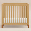 Gelato 4-in-1 Convertible Mini Crib and Twin bed in Natural Walnut Finish with Gold Feet