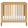 Gelato 4-in-1 Convertible Mini Crib and Twin bed in Natural Walnut Finish with Gold Feet