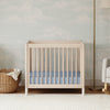 Gelato 4-in-1 Convertible Mini Crib and Twin bed in Natural Walnut Finish with Gold Feet